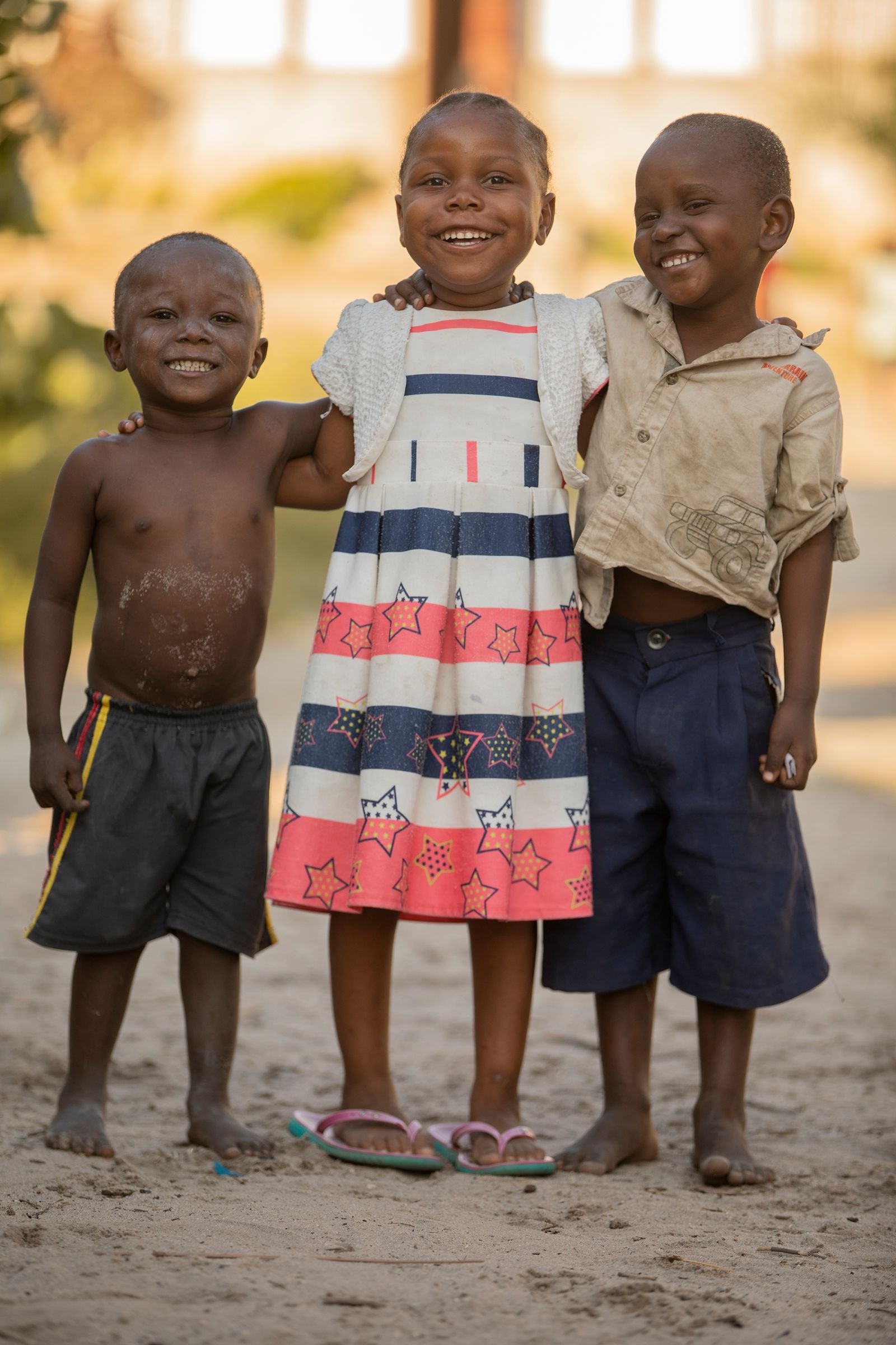 Children in a village setting, representing the communities that benefit from staple-food fortification programmes
